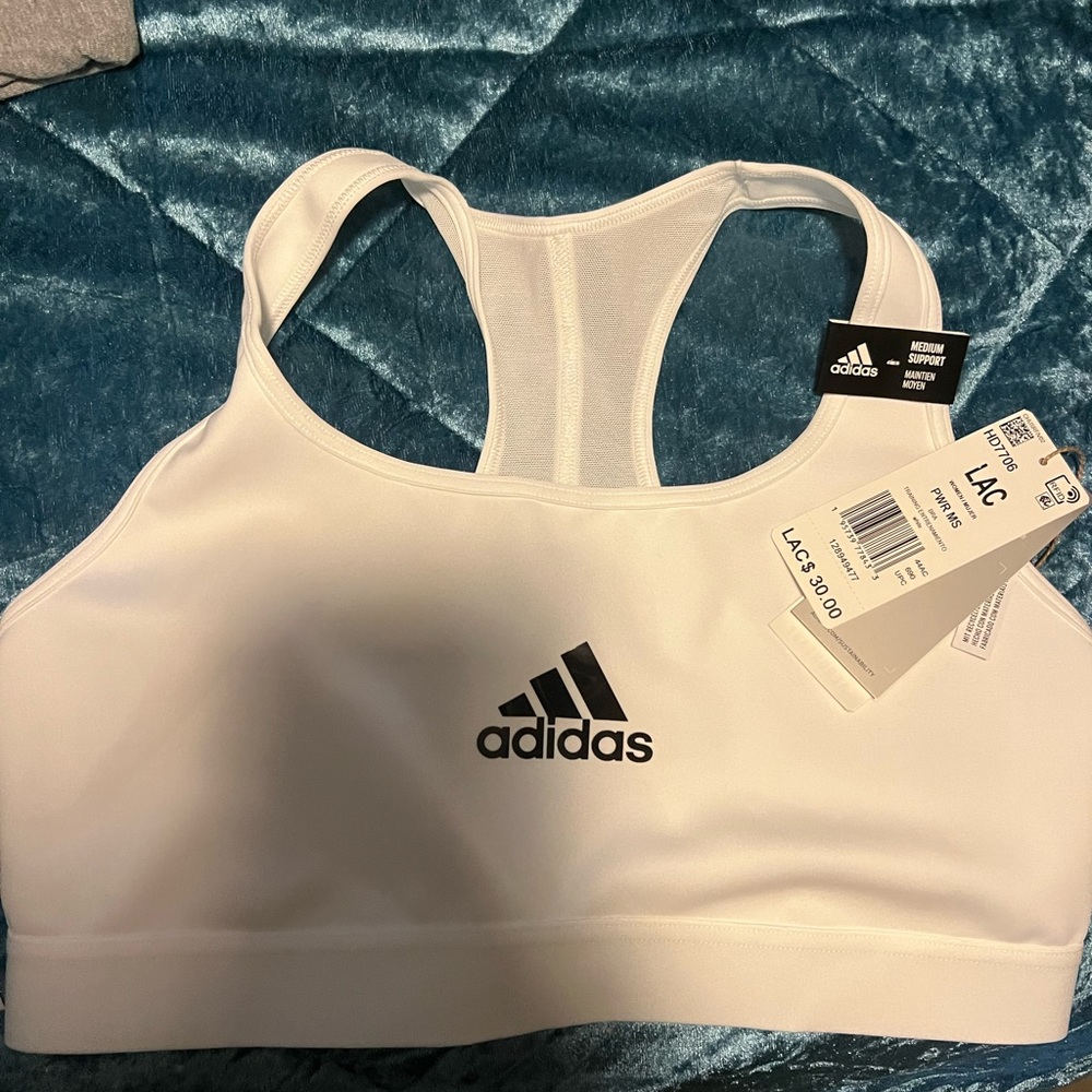 Brand new with tags. Adidas sports bra size Large. Open to reasonable offers
